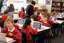 Holy Rosary students at play Technology is integrated into the curriculum.